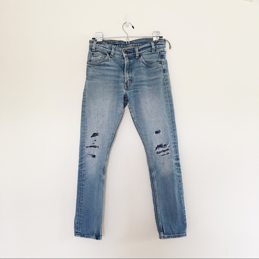LEVI JEANS WITH VISIBLE MENDING